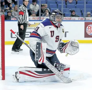  ?? KEVIN HOFFMAN/GETTY IMAGES ?? United States’ goaltender Joseph Woll stops a shot against Finland during the IIHF World Junior Championsh­ip at KeyBank Center on Dec. 31, in Buffalo.