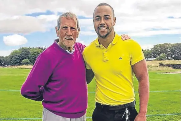  ??  ?? Ronnie Ingram, who has scored his second hole-in-one, pictured with his grandson Donnell Ingram.