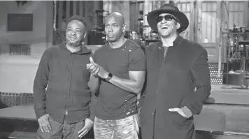  ?? ROSALIND O’CONNOR, AP ?? Musical guests Jarobi White and Q- Tip of A Tribe Called Quest join Chappelle on the SNL stage.