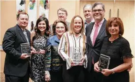  ??  ?? Top producers were honored at the event. Pictured from left are Stephen Sheffer, Lauren Walker, Beth Wolff, Jason Henricks, Holley Madden, Shayne Stinson, Ed Wolff and Roya Arfa.