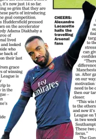  ??  ?? CHEERS: Alexandre Lacazette hails the travelling Arsenal fans
