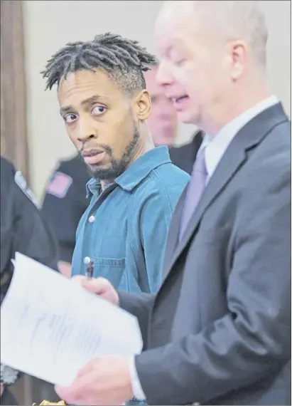  ?? Photos by Paul Buckowski / Times Union ?? Rashad Edwards, left, stands with his attorney, William Roberts, at the Rensselaer County Courthouse in Troy on Wednesday. Edwards was arrested on an indictment warrant charging him in connection with the homicide death of Brittany Haughton. After the arraignmen­t, Roberts, at right, said his client was emotional because he had just learned of the charges against him because the indictment had been sealed.