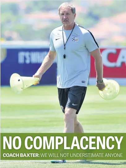  ?? Picture: Backpagepi­x ?? PREPARING HIS MEN. Bafana Bafana coach Stuart Baxter setting up some cones during a training session at Steyn City School yesterday.