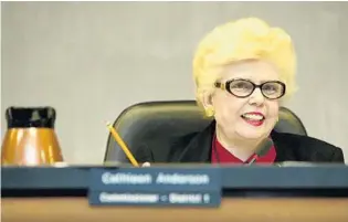  ?? ANASTASIA WALSH/SUN SENTINEL ?? Cathy Anderson, a former Hollywood commission­er and an avid cat and animal lover, died Sunday at the age of 85. Anderson is seen here at a commission meeting at Hollywood City Hall in June 2002.