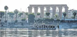  ?? ?? A river boat sailing on the
Nile past the Temple of
Luxor. KHALED DESOUKI/AFP via Getty Images)