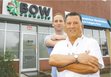  ?? DARREN MAKOWICHUK ?? Jamal Ramadan, president and owner of Bow Cannabis, with son and general manager Jim Ramadan. Jim says it’s “farcical” to obscure the windows of stores like his since passersby can’t see the product inside.