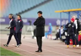  ??  ?? NANJING: This file photo taken on March 1, 2017 shows China’s Jiangsu FC head coach Choi Yong Soo reacting during the AFC Champions League group stage football match against Australia’s Adelaide United in Nanjing, east China’s Jiangsu province. High...