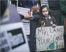  ?? Gina Ferazzi Los Angeles Times ?? MAYA CASILLAS joins in an immigratio­n protest in January. A state bill would limit state and local officers’ ability to help U.S. agents enforce immigratio­n laws.