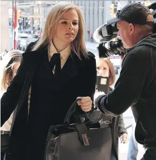  ?? COLIN PERKEL/THE CANADIAN PRESS ?? Laura Miller, who was deputy chief of staff to former Ontario premier Dalton McGuinty, arrives at court Monday in Toronto. Miller and her former superior, David Livingston, are alleged to have illegally destroyed documents related to the decision to...
