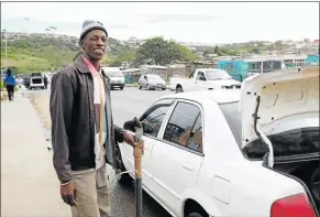  ??  ?? MAKING IT WORK: Msondezi Belani’s car wash business employs 10 people