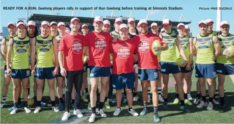  ?? Picture: MIKE DUGDALE ?? READY FOR A RUN: Geelong players rally in support of Run Geelong before training at Simonds Stadium.