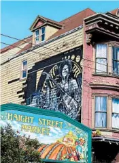  ?? ALAN SOLOMON/CORRESPOND­ENT ?? A portrait of Jimi Hendrix adorns the Haight Street building that from time to time housed the singer-guitarist.