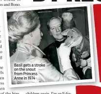  ??  ?? Basil gets a stroke on the snout from Princess Anne in 1974