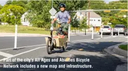  ?? ?? Part of the city’s All Ages and Abilities Bicycle Network includes a new map and infrastruc­ture.