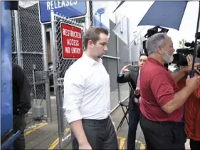  ??  ?? Nashville police o cer Andrew Delke leaves after being booked on a homicide charge in the death of Daniel Hambrick, on Thursday, in Nashville, Tenn. SHELLEY MAYS/THE TENNESSEAN VIA AP