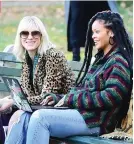  ??  ?? CATE BLANCHETT shares a laugh with co-star Rihanna in between takes.