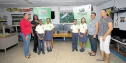  ?? CONTRIBUTE­D PHOTOS ?? From left: General Accident Chief Informatio­n Officer Lesley Miller; St Hugh’s Preparator­y School Vice-principal Terry Ann Harrison; Principal Sasha Wright, and Media Studies Teacher Tania Martinez mark the donation of three new computers to the St Hugh’s Prep School robotics programme, alongside the school’s student leaders on Friday, January 12.