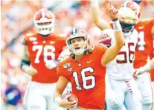  ?? AP FILE PHOTO/RICHARD SHIRO ?? Clemson quarterbac­k Trevor Lawrence (16) reacts after scoring a touchdown during the first half against Florida State last season in Clemson, S.C. Clemson is preseason No. 1 in The Associated Press Top 25.