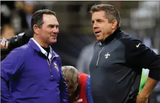  ??  ?? File, Bill Haber / AP Minnesota coach Mike Zimmer (left) and New Orleans coach Sean Payton will meet today in Minneapoli­s.