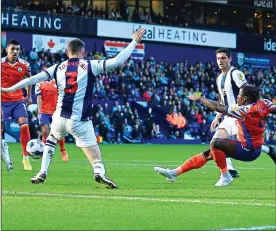  ?? ?? SWEET FINISH: Obafemi scores the winner to pile the pressure on boss Bruce