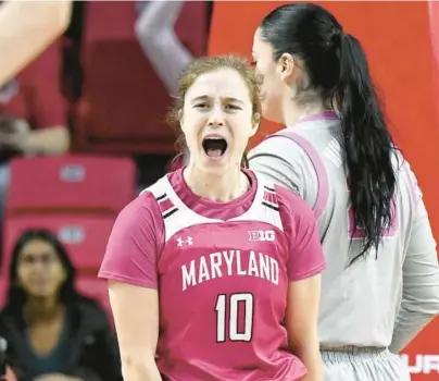  ?? GREG FIUME/GETTY ?? Maryland guard Abby Meyers celebrates after scoring during the first quarter against Ohio State on Sunday at Xfinity Center. Meyers, a senior, had 22 points and six rebounds.