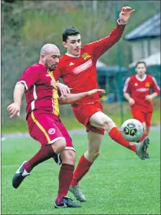  ??  ?? SLT’s Sean Noble takes the ball from the air.