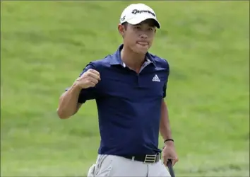  ?? Associated Press ?? Collin Morikawa reacts after making a 25-foot birdie putt on the first playoff hole, matching Justin Thomas’ from 50 feet. Morikawa won two holes later with a par.