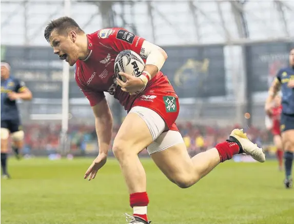  ??  ?? > One of 13 tries for Steff Evans in the PRO12 last term; this one was one of the most memorable as he raced over during the Grand Final against Munster