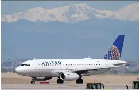  ?? (AP) ?? A United Airlines jetliner taxis for take off from Denver Internatio­nal Airport in this file photo. Planes from the U.S. to Europe were packed this summer, and United Airlines figures the same thing will happen next year.