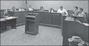  ?? NWA Democrat-Gazette/MIKE JONES ?? Bentonvill­e’s City Council worked through a light agenda Tuesday night. The council agreed to accept a $1.9 million Walton Family Foundation grant to help pay for design and redesign work for street projects.