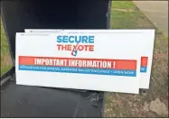  ?? Daniel Bell ?? A pair of the absentee ballot request forms are shown sitting on a mailbox.