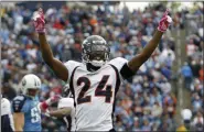  ?? MARK HUMPHREY - THE ASSOCIATED PRESS ?? FILE - In this Oct. 30, 2010, file photo, Denver Broncos defenders Champ Bailey (24) celebrates after the Broncos recovered a kickoff that the Tennessee Titans could not hang onto late in the fourth quarter of a game, in Nashville, Tenn.