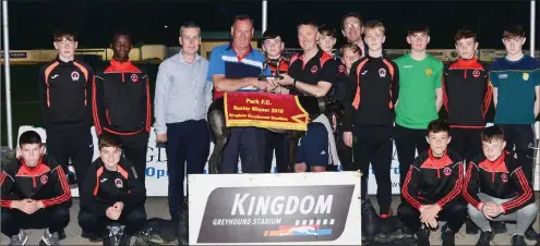  ??  ?? Pat Dooley and the St. Brendan’s Park U-14 team presenting the prize to Mike Keane after their dog, Honthehill, won the Buster race on Friday last. Photo by David O’Sullivan