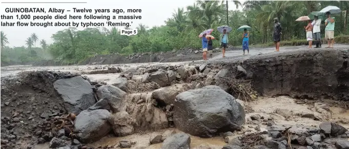  ?? (Aaron B. Recuenco) ?? A HANDFUL of residents of Barangay Maninila monitor the water level of one of the gullies formed by the destructiv­e mudflows brought by typhoon ‘Reming’ in 2006. Heavy rains have again raised the danger of lahar that can bury villages.