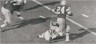  ?? AP ?? Willie Wood intercepts a pass against the Chiefs in Super Bowl I.