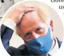  ??  ?? Political cover up:
Boris’s mask order has met with criticism