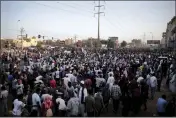  ?? MARWAN ALI — THE ASSOCIATED PRESS ?? People gather during a protest in Khartoum, Sudan, on Saturday.