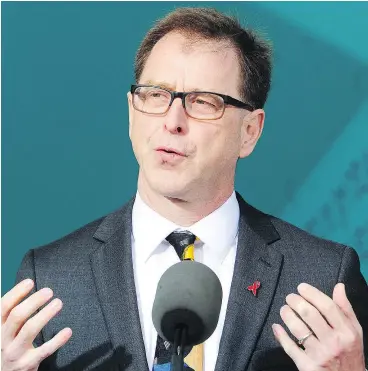  ?? — NICK PROCAYLO FILES ?? Health minister Adrian Dix announced the opening of an urgent care clinic in downtown Vancouver to be open on evenings and weekends.