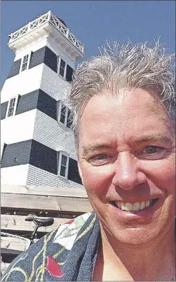  ?? SUBMITTED PHOTO ?? Warren Spires takes a break at the West Point lighthouse during his bicycle tour of Prince Edward Island this past September. The Nova Scotia man is currently on a Tour de Cuba solo ride to raise funds for CNIB programs.