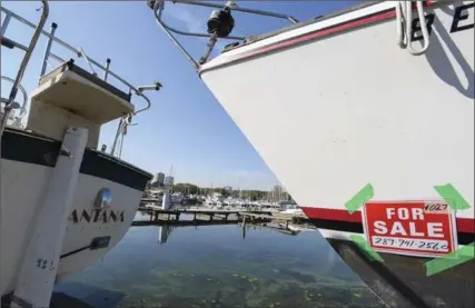  ?? PHOTOS BY GARY YOKOYAMA, THE HAMILTON SPECTATOR ?? A sailboat for sale at MacDonald Marine. The 40-plus-year-old boat repair business and marina has 35 powerboats and sailboats listed for sale online.