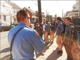  ?? DIGITAL FIRST MEDIA FILE PHOTOS ?? A Pottstown Police Officer trying to move a crowd of Pottstown Middle School students along down North Franklin after school got some back-talk from some of the students.