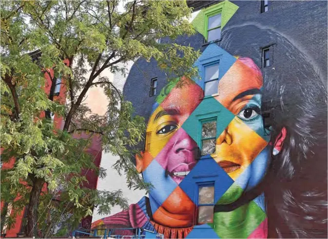  ??  ?? This photo shows a Michael Jackson mural painted by Brazilian street artist Eduardo Kobra in New York City. — AFP