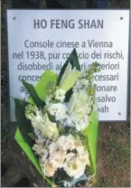  ?? PHOTOS BY CECILY LIU/CHINA DAILY ?? daughter of Ho Feng Shan, meets Italian children who visited the Garden of Monte Stella on March 14 to honor humanitari­an heroes. Right: A stone plaque in the Garden of Monte Stella in Milan honors Ho.