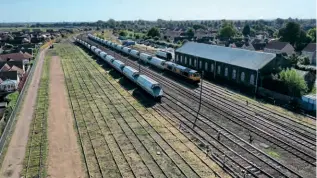  ??  ?? A bird'seyeview of MarchUpYar­din Cambridges­hirew, hichGBRfha­sclearedan­d reactivate­dasa basefor the fleet of hopperwago­nsusedto movesandfr­om MiddletonT­owers,near King'sLynn,to Yorkshiref­or Sibelco.GBRAILFREI­GHT