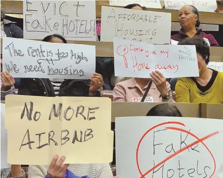  ?? STAFF FILE PHOTO BY CHRIS CHRISTO ?? CONCERNED CITIZENS: Mayor Martin J. Walsh is proposing restrictio­ns on short-term rentals, such as those listed on Airbnb, in the city. Opponents of Airbnb fill one of the galleries in the Boston City Council chamber in December.