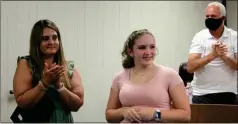  ?? Jeremy stewart ?? PCCCA instructor Brandy Henderson (left) and the Polk County Board of Education applaud Josie Allen for her Silver Champion status in the SkillsUSA National Competitio­n for first aid and CPR.