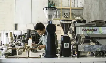  ??  ?? Busy brewing: Fourbyfore chief executive officer Andy Ng prepping a brew at Foremula.