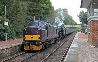  ?? GORDON KIRKBY ?? With the ‘Jacobite’ season drawing to a close, one of the two rakes of stock was taken back from Fort William to Carnforth on October 12 with diesel No. 37518 and steam No. 45212 in charge, the pairing seen heading south at Spean Bridge. The peak summer months sees two ‘Jacobite’ trips running each day, but only one runs during the final month of October.