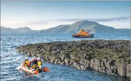  ??  ?? The crew of the Severn-class lifeboat Elizabeth Fairlie Ramsey and her daughter craft carried out an exercise along the newly restored path to the lighthouse at Rubha nan Gall.