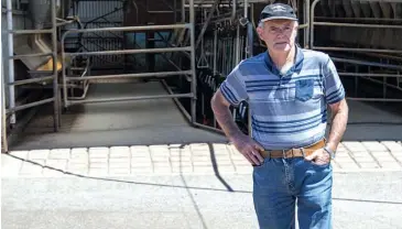  ??  ?? Trevor Collins at the dairy that was built on his Neerim Junction property 47 years ago but which Baw Baw Council has just been discovered rating purposes, a claim that has stunned and angered Mr Collins whose supplement­ary rate for this year has...
